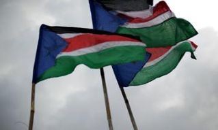 South Sudan flags fly in the sky